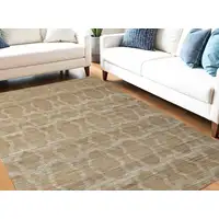 Photo of Tan and Ivory Geometric Hand Woven Area Rug