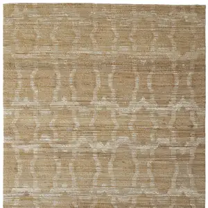 Photo of Tan and Ivory Geometric Hand Woven Area Rug