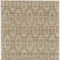 Photo of Tan and Ivory Geometric Hand Woven Area Rug