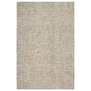 Photo of Tan and Ivory Grid Area Rug