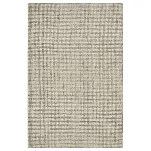 Photo of Tan and Ivory Grid Area Rug