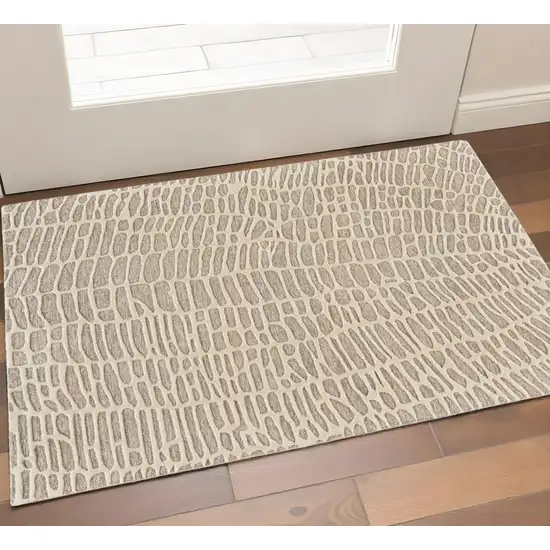 Tan and Ivory Wool Abstract Hand Tufted Area Rug Photo 1