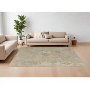 Photo of Tan and Ivory Wool Floral Hand Knotted Area Rug