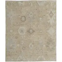 Photo of Tan and Ivory Wool Floral Hand Knotted Area Rug