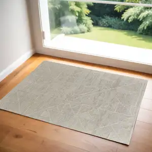 Photo of Tan and Ivory Wool Hand Knotted Area Rug