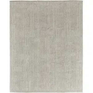 Photo of Tan and Ivory Wool Hand Knotted Area Rug