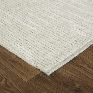 Photo of Tan and Ivory Wool Hand Knotted Area Rug