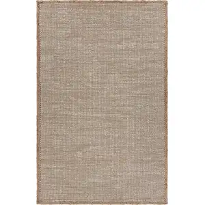 Photo of Tan and White Braid Border Area Rug