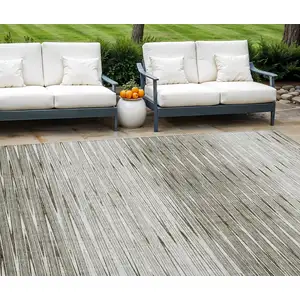 Photo of Taupe And Beige Abstract Washable Indoor Outdoor Area Rug