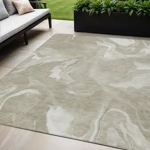 Photo of Taupe And Beige Abstract Washable Indoor Outdoor Area Rug