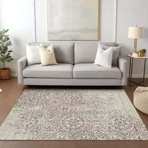 Photo of Taupe And Beige Medallion Washable Indoor Outdoor Area Rug