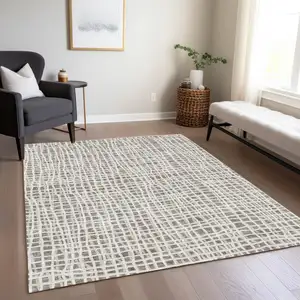 Photo of Taupe And Beige Striped Washable Indoor Outdoor Area Rug