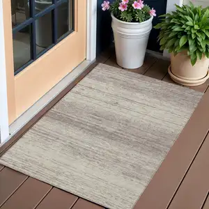 Photo of Taupe And Beige Striped Washable Indoor Outdoor Area Rug