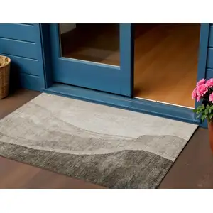 Photo of Taupe And Brown Abstract Washable Indoor Outdoor Area Rug