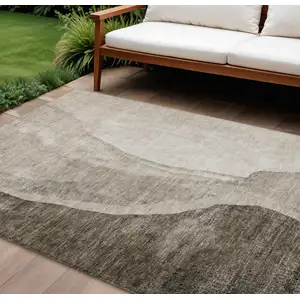 Photo of Taupe And Brown Abstract Washable Indoor Outdoor Area Rug