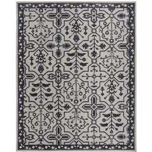 Photo of Taupe And Gray Wool Floral Tufted Handmade Stain Resistant Area Rug