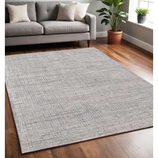 Taupe and Ivory Plaid Power Loom Distressed Area Rug Photo 1