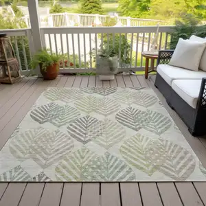 Photo of Taupe Beige And Artichoke Green Floral Washable Indoor Outdoor Area Rug