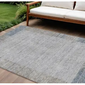 Photo of Taupe Beige And Blue Geometric Washable Indoor Outdoor Area Rug