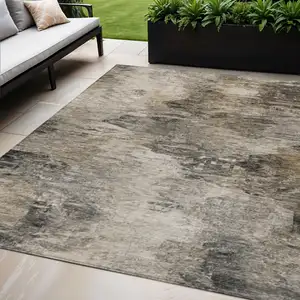 Photo of Taupe Beige And Brown Abstract Washable Indoor Outdoor Area Rug