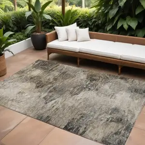 Photo of Taupe Beige And Brown Abstract Washable Indoor Outdoor Area Rug