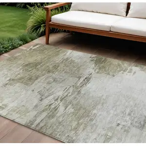 Photo of Taupe Beige And Brown Abstract Washable Indoor Outdoor Area Rug