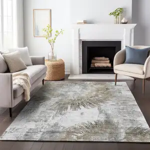 Photo of Taupe Beige And Brown Abstract Washable Indoor Outdoor Area Rug