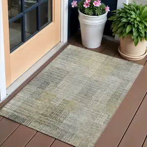 Photo of Taupe Beige And Brown Abstract Washable Indoor Outdoor Area Rug