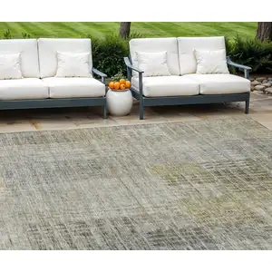 Photo of Taupe Beige And Brown Abstract Washable Indoor Outdoor Area Rug