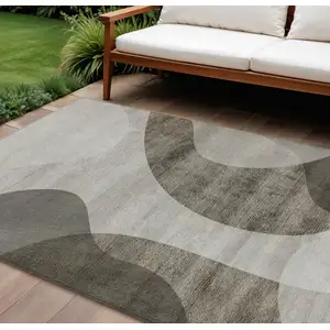 Photo of Taupe Beige And Chocolate Abstract Washable Indoor Outdoor Area Rug