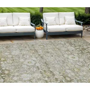 Photo of Taupe Beige And Gold Oriental Washable Indoor Outdoor Area Rug