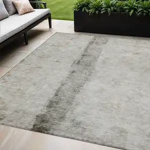 Photo of Taupe Beige And Gray Abstract Washable Indoor Outdoor Area Rug