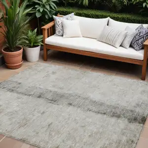 Photo of Taupe Beige And Gray Abstract Washable Indoor Outdoor Area Rug