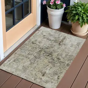 Photo of Taupe Beige And Gray Abstract Washable Indoor Outdoor Area Rug