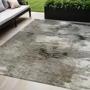 Photo of Taupe Beige And Ivory Abstract Washable Indoor Outdoor Area Rug