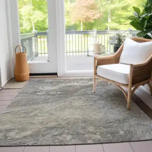 Photo of Taupe Beige And Ivory Abstract Washable Indoor Outdoor Area Rug