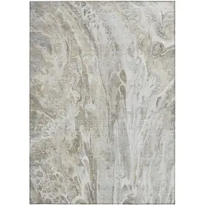 Photo of Taupe Beige And Ivory Abstract Washable Indoor Outdoor Area Rug