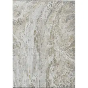 Photo of Taupe Beige And Ivory Abstract Washable Indoor Outdoor Area Rug