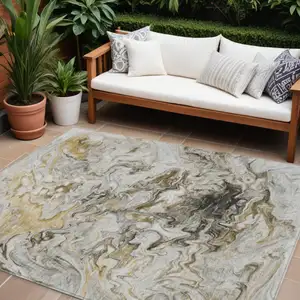 Photo of Taupe Beige And Ivory Abstract Washable Indoor Outdoor Area Rug