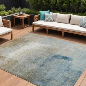 Photo of Taupe Beige And Ivory Abstract Washable Indoor Outdoor Area Rug