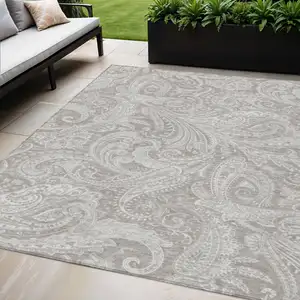 Photo of Taupe Beige And Ivory Paisley Washable Indoor Outdoor Area Rug