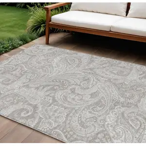 Photo of Taupe Beige And Ivory Paisley Washable Indoor Outdoor Area Rug