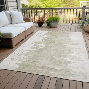 Photo of Taupe Beige And Tan Abstract Washable Indoor Outdoor Area Rug