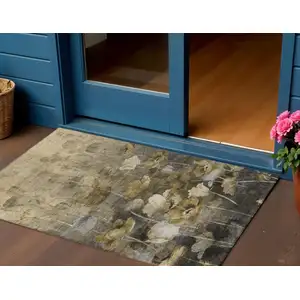 Photo of Taupe Beige And Tan Floral Washable Indoor Outdoor Area Rug