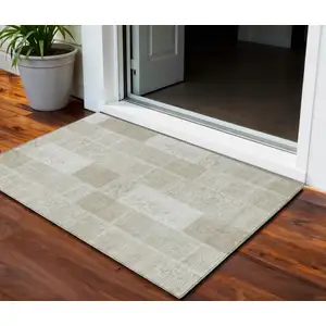 Photo of Taupe Beige And Tan Patchwork Washable Indoor Outdoor Area Rug