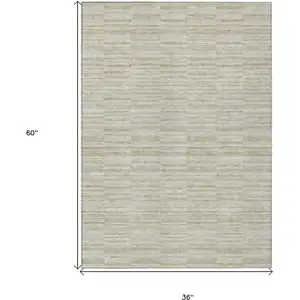 Photo of Taupe Beige And Tan Striped Washable Indoor Outdoor Area Rug