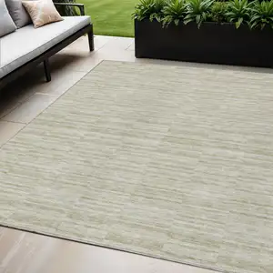 Photo of Taupe Beige And Tan Striped Washable Indoor Outdoor Area Rug