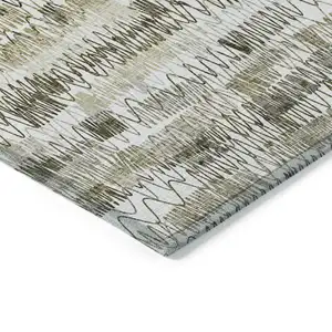 Photo of Taupe Beige And Tan Striped Washable Indoor Outdoor Area Rug