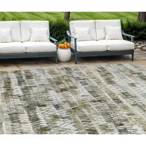 Photo of Taupe Beige And Tan Striped Washable Indoor Outdoor Area Rug