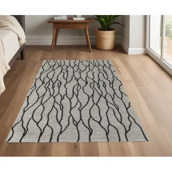 Taupe Black And Gray Wool Abstract Tufted Handmade Stain Resistant Area Rug Photo 1